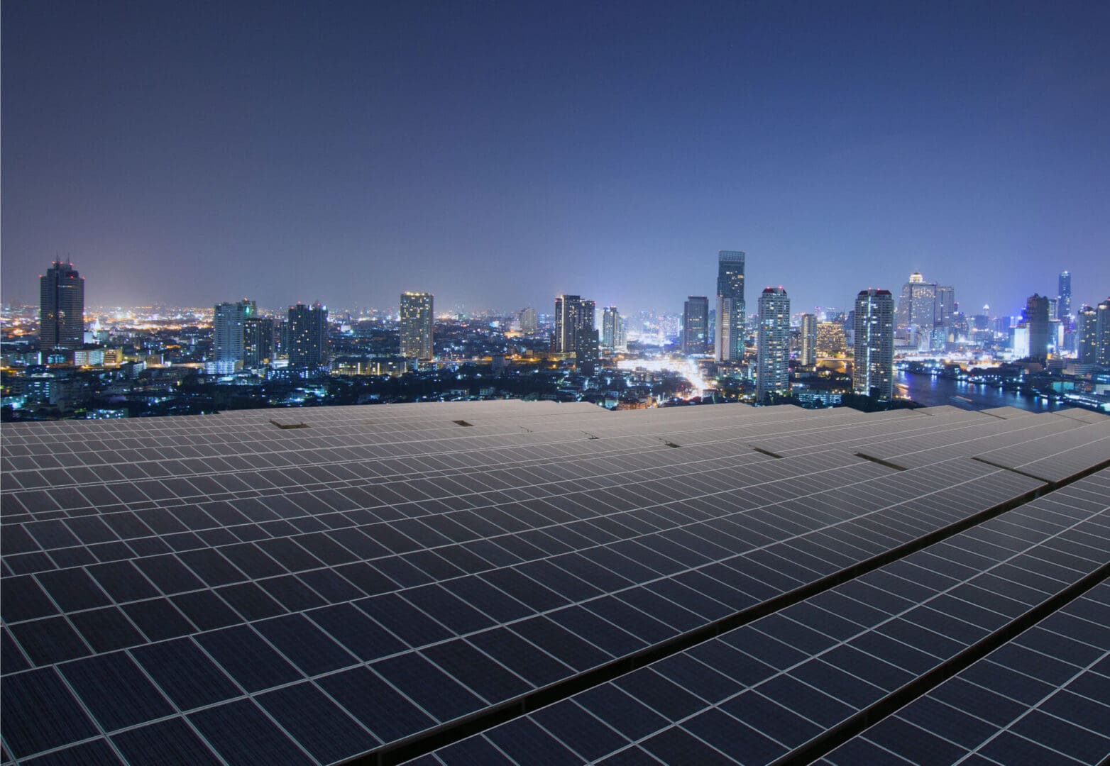 69326051 - solar panel,solar farm with twilight cityscape